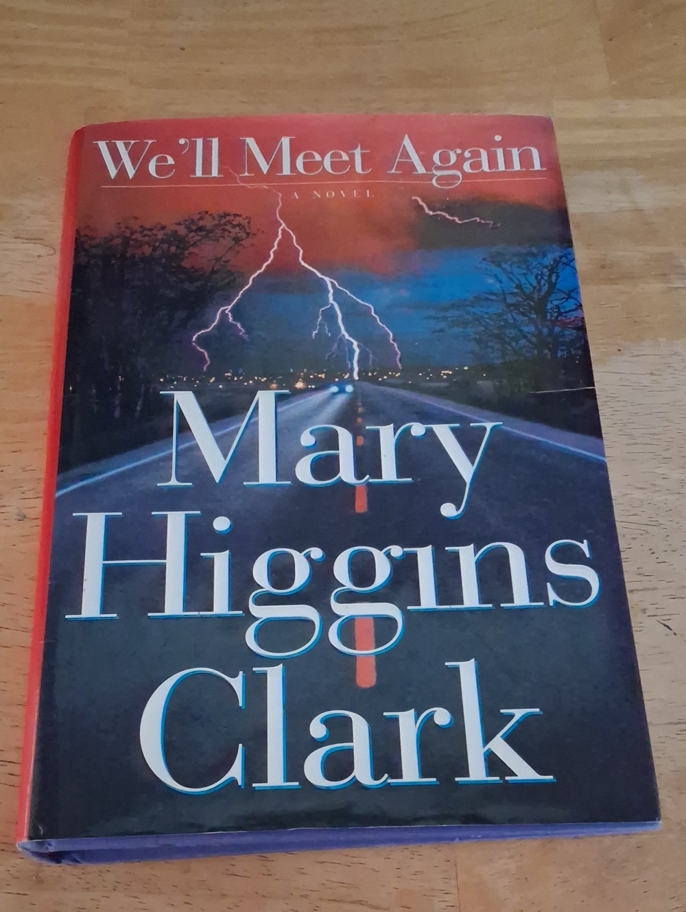 We'll Meet Again Hardcover Coffee Table Book by - Red and Black